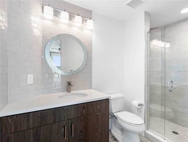 19816 Gulf Blvd Unit 602, Indian Shores, FL 33785 - bathroom featuring vanity, visible vents, a shower stall, and toilet