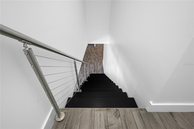 19816 Gulf Blvd Unit 602, Indian Shores, FL 33785 - stairs featuring wood finished floors