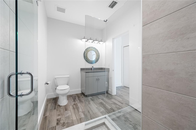 19816 Gulf Blvd Unit 602, Indian Shores, FL 33785 - full bath featuring visible vents, vanity, a shower with door, and toilet