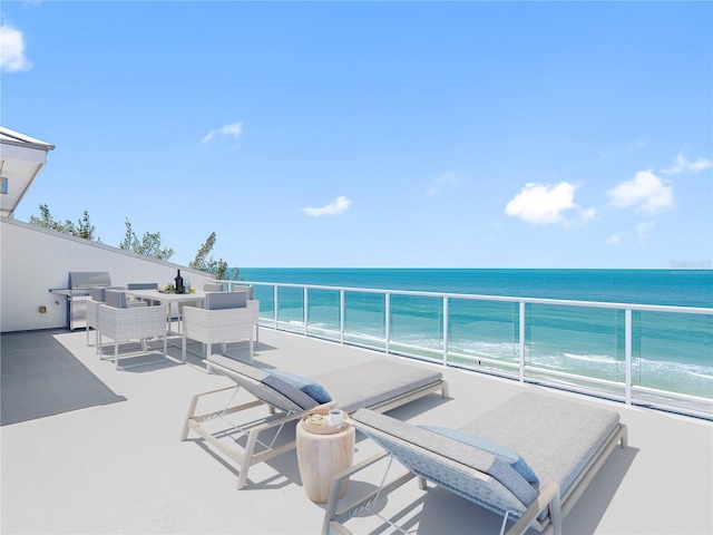 19816 Gulf Blvd Unit 602, Indian Shores, FL 33785 - view of patio / terrace with a view of the beach, a water view, and a balcony