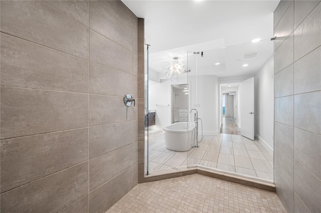 19816 Gulf Blvd Unit 602, Indian Shores, FL 33785 - full bathroom with tile patterned flooring, a soaking tub, and recessed lighting