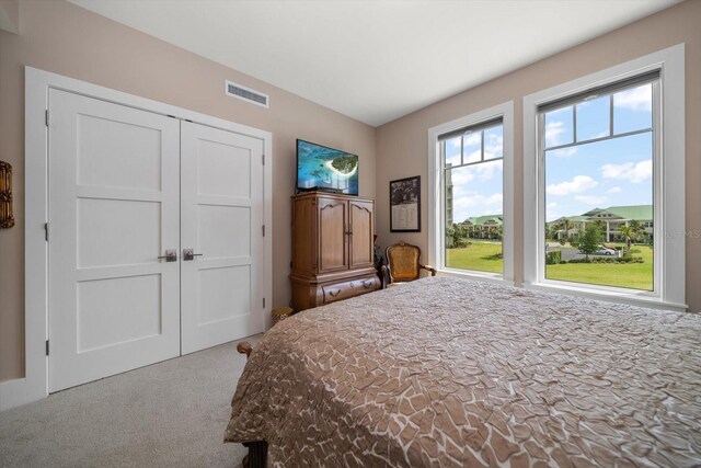 145 Belleview Blvd Unit 201, Belleair, FL 33756 - carpeted bedroom with a closet and visible vents