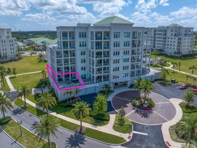 145 Belleview Blvd Unit 201, Belleair, FL 33756 - view of building exterior with uncovered parking