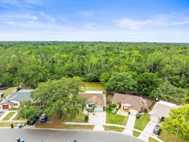 16116 Manorwood Cir, Tampa, FL 33624 - drone / aerial view with a residential view and a forest view