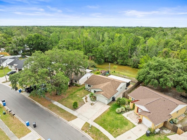 16116 Manorwood Cir, Tampa, FL 33624 - drone / aerial view featuring a wooded view and a residential view