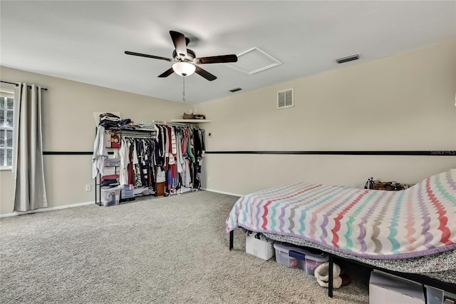 bedroom featuring carpet, visible vents, and a ceiling fan