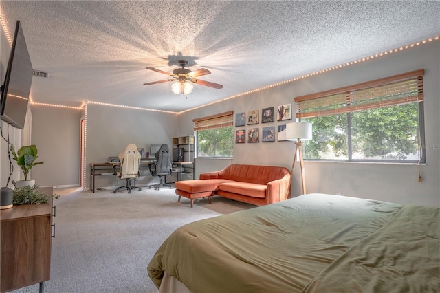 1916 River Crossing Dr, Valrico, FL 33596 - carpeted bedroom with a textured ceiling, ceiling fan, and visible vents