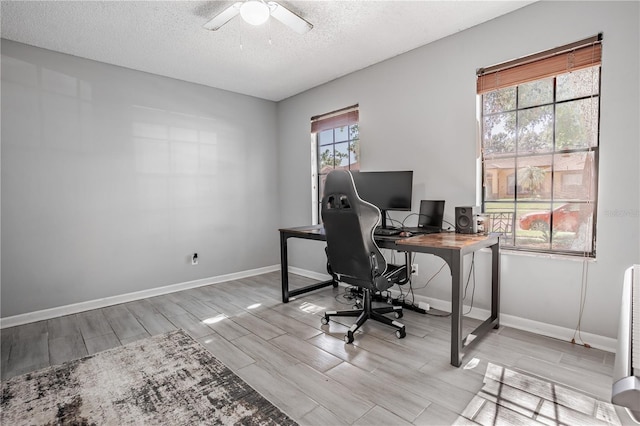 1916 River Crossing Dr, Valrico, FL 33596 - office space with a ceiling fan, baseboards, wood finish floors, and a textured ceiling