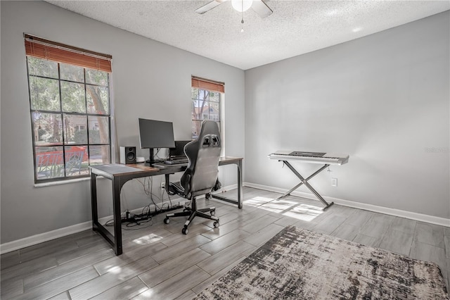 1916 River Crossing Dr, Valrico, FL 33596 - office with baseboards, a ceiling fan, a textured ceiling, and wood tiled floor