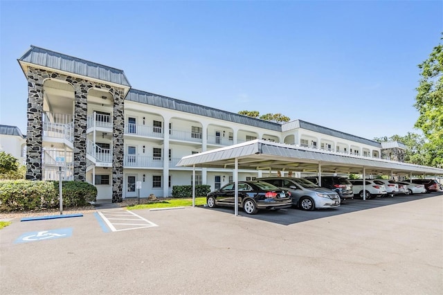 view of partially covered parking lot