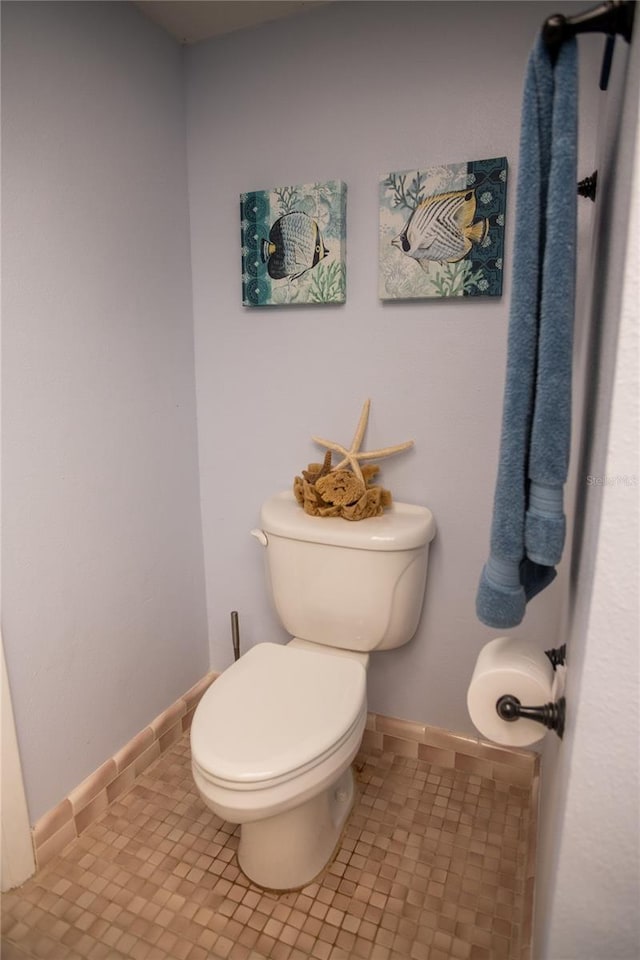 2630 Pearce Dr Unit 104, Clearwater, FL 33764 - bathroom with toilet and baseboards