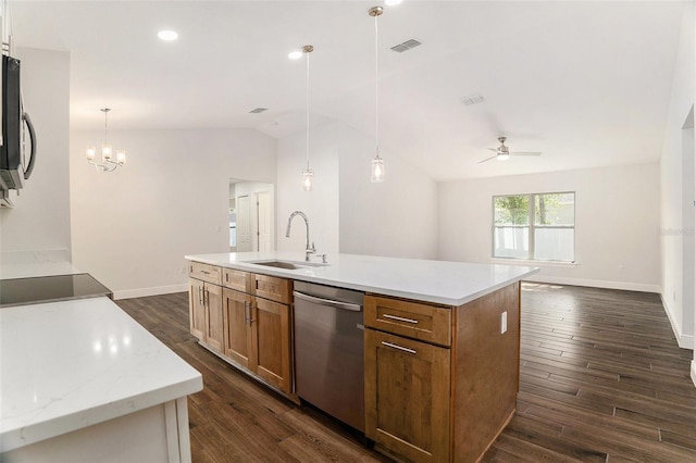 kitchen with a sink, visible vents, dishwasher, dark wood finished floors, and vaulted ceiling