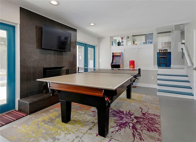 game room with a wealth of natural light, french doors, and recessed lighting
