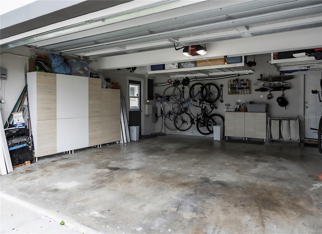 garage featuring a garage door opener