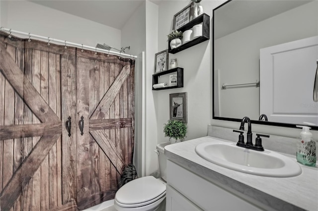 full bath featuring curtained shower, vanity, and toilet