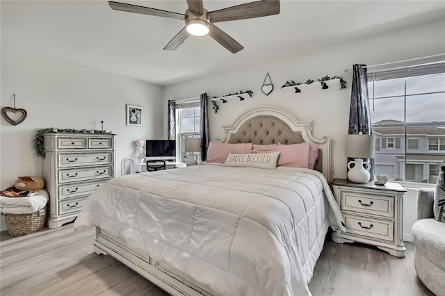 bedroom featuring ceiling fan and wood finished floors