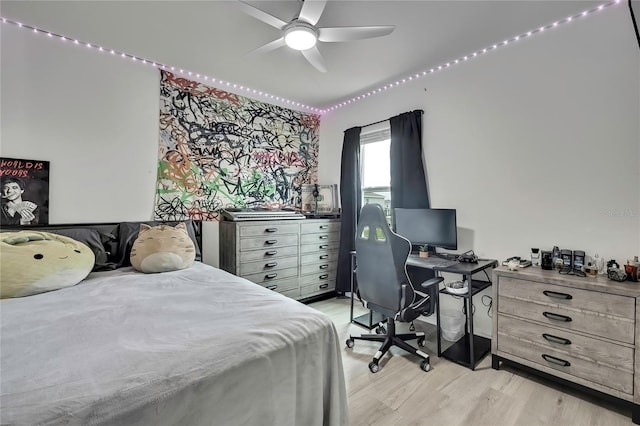 bedroom featuring light wood-style floors