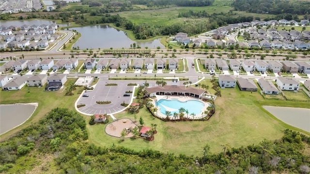 aerial view featuring a residential view and a water view