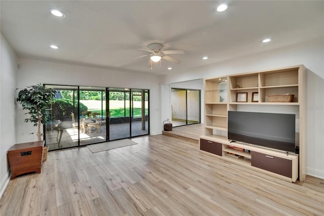 unfurnished living room featuring light wood-style floors, baseboards, a ceiling fan, and recessed lighting