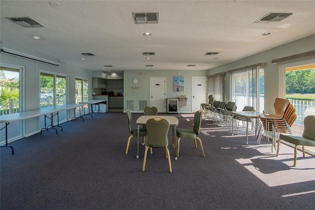 dining room with visible vents and a healthy amount of sunlight