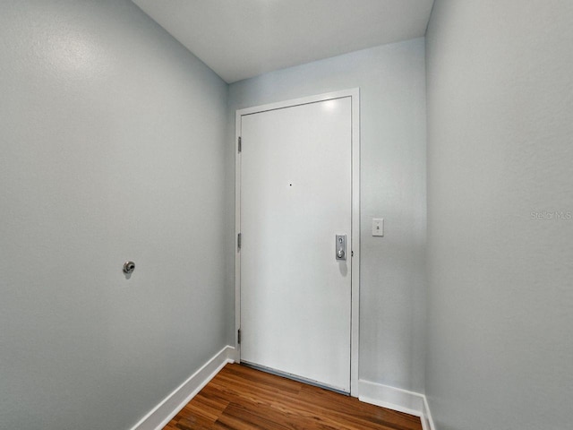 1208 E Kennedy Blvd Unit 1125, Tampa, FL 33602 - unfurnished bedroom with baseboards and dark wood finished floors
