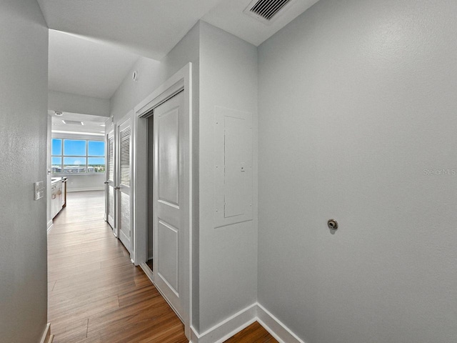 1208 E Kennedy Blvd Unit 1125, Tampa, FL 33602 - corridor with wood finished floors and electric panel