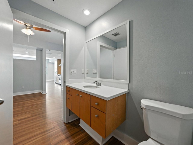 1208 E Kennedy Blvd Unit 1125, Tampa, FL 33602 - bathroom featuring ceiling fan, vanity, and wood finished floors