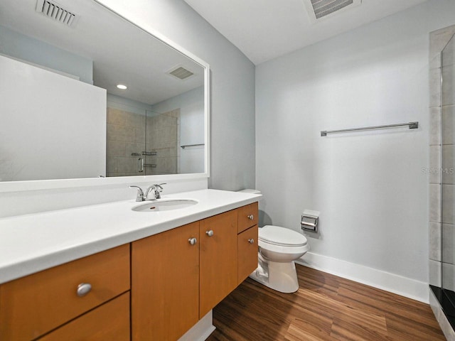 1208 E Kennedy Blvd Unit 1125, Tampa, FL 33602 - full bathroom with vanity, wood finished floors, and tiled shower