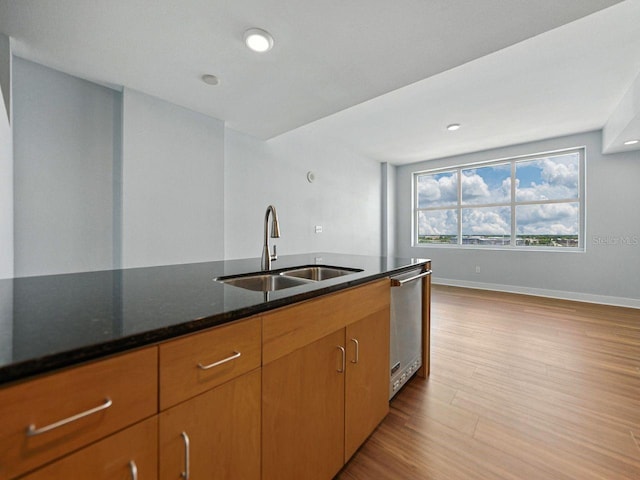 1208 E Kennedy Blvd Unit 1125, Tampa, FL 33602 - kitchen featuring dishwasher, dark stone countertops, light wood finished floors, and recessed lighting