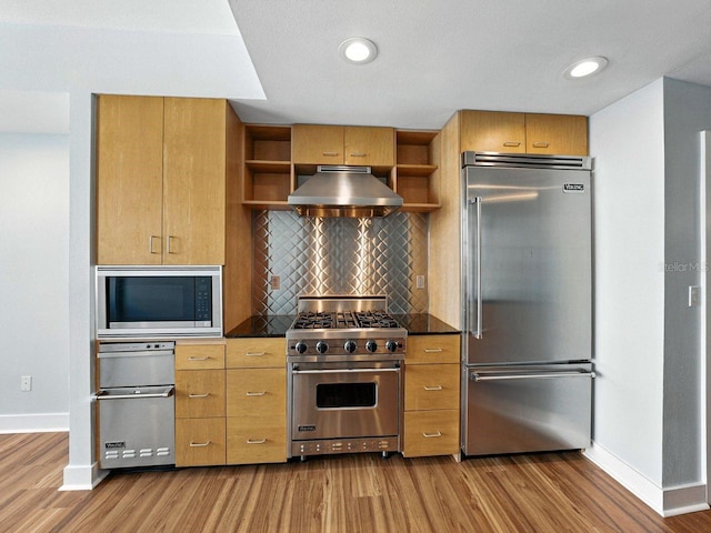 1208 E Kennedy Blvd Unit 1125, Tampa, FL 33602 - kitchen with premium appliances, exhaust hood, open shelves, wood finished floors, and recessed lighting