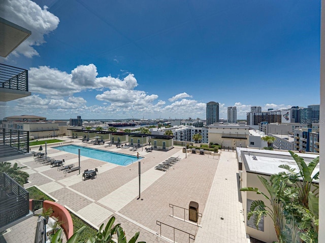 1208 E Kennedy Blvd Unit 1125, Tampa, FL 33602 - community pool featuring a patio area and a view of city