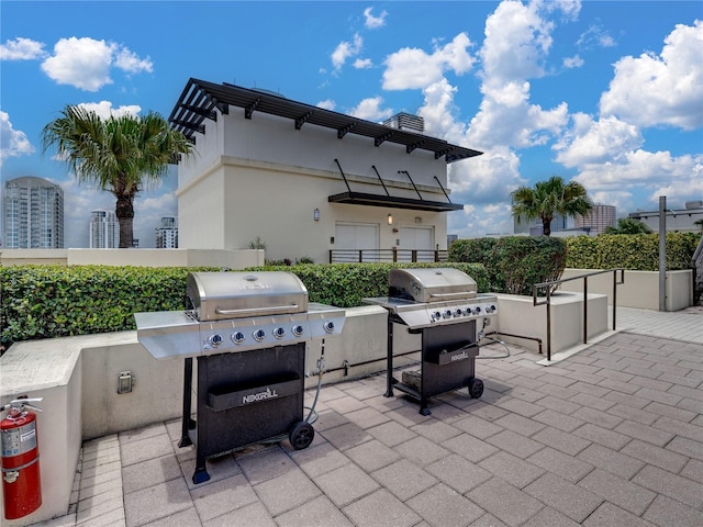 1208 E Kennedy Blvd Unit 1125, Tampa, FL 33602 - view of patio / terrace featuring a grill