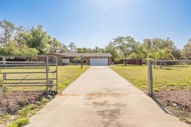 single story home featuring a garage, driveway, fence, and a front lawn