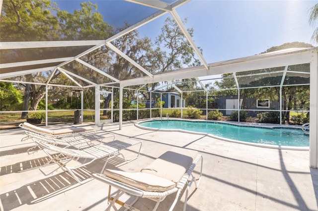 pool featuring a patio area and a lanai