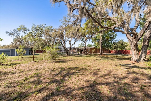 view of yard featuring fence