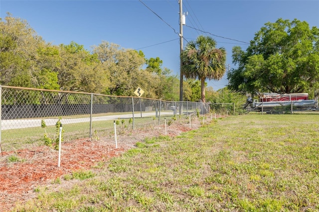 view of yard featuring fence