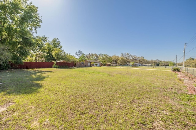 view of yard with fence