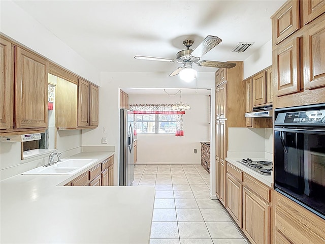 13116 N Oregon Ave, Tampa, FL 33612 - kitchen featuring a sink, visible vents, range hood, ceiling fan, and appliances with stainless steel finishes