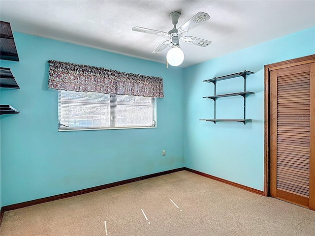 13116 N Oregon Ave, Tampa, FL 33612 - unfurnished bedroom with baseboards, a ceiling fan, carpet flooring, and a closet