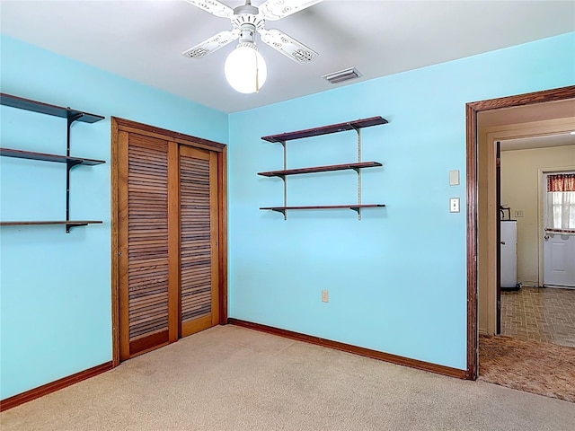 13116 N Oregon Ave, Tampa, FL 33612 - unfurnished bedroom with a closet, carpet floors, visible vents, and baseboards