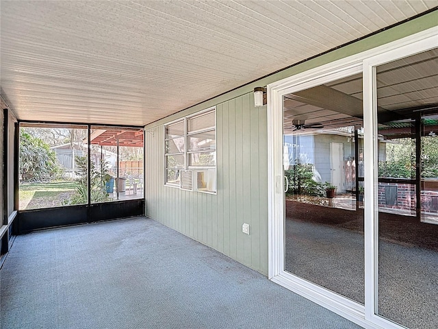 13116 N Oregon Ave, Tampa, FL 33612 - unfurnished sunroom featuring plenty of natural light and a ceiling fan