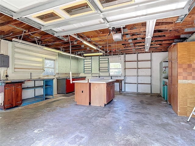 13116 N Oregon Ave, Tampa, FL 33612 - garage featuring visible vents and a garage door opener