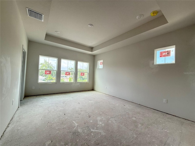 5001 21st Ave N, Saint Petersburg, FL 33710 - empty room with a raised ceiling and plenty of natural light