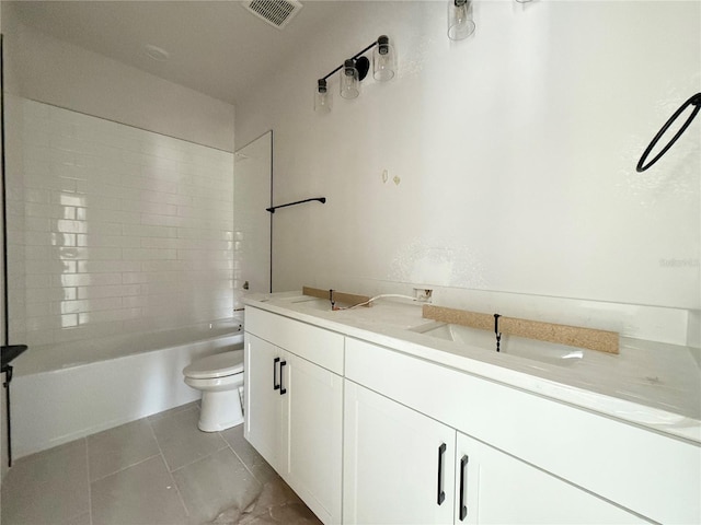 5001 21st Ave N, Saint Petersburg, FL 33710 - full bathroom with tile patterned floors, double vanity, and shower / tub combination