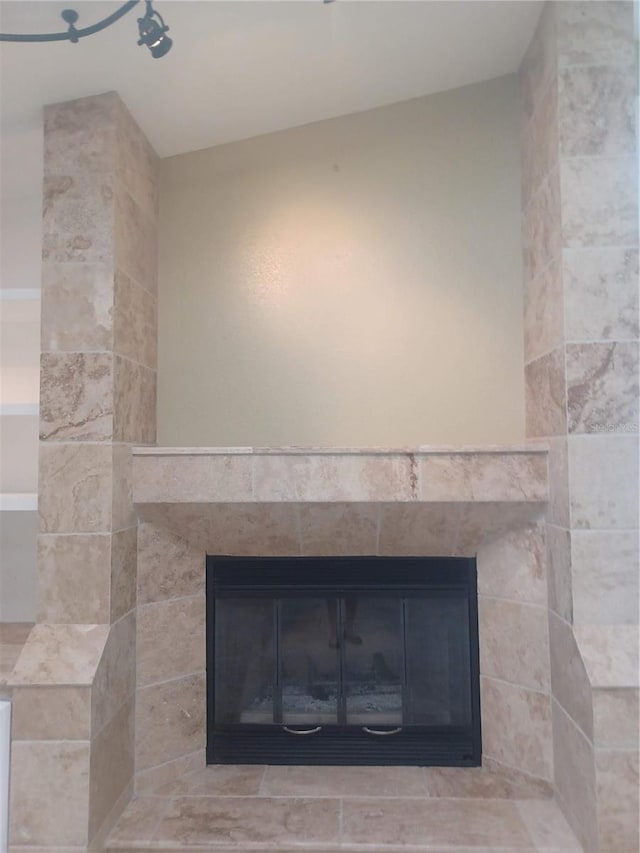 interior details with a fireplace