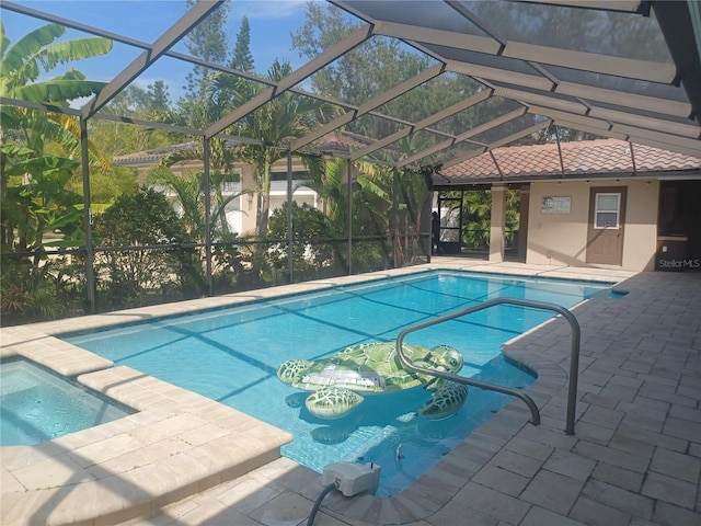 pool featuring a lanai and a patio