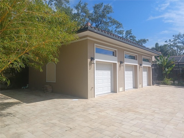 garage with driveway