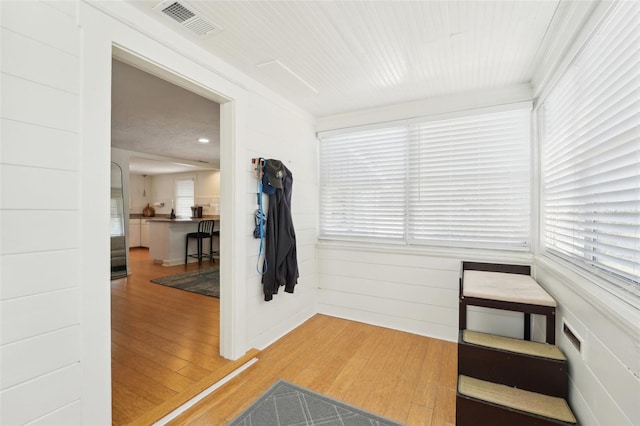 3611 4th Ave N, Saint Petersburg, FL 33713 - hallway featuring visible vents and wood finished floors