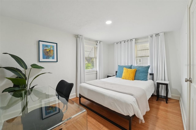 3611 4th Ave N, Saint Petersburg, FL 33713 - bedroom with recessed lighting, light wood-style flooring, multiple windows, and baseboards