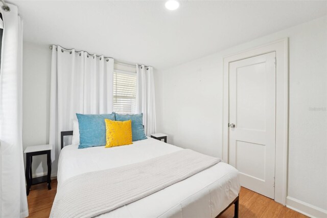 3611 4th Ave N, Saint Petersburg, FL 33713 - bedroom with light wood-style flooring, recessed lighting, and baseboards